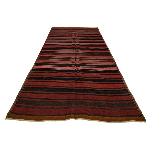 Wool vintage handwoven kilim rug from Kars region of Turkey. Approximately 50-60 years old. ın very good condition.