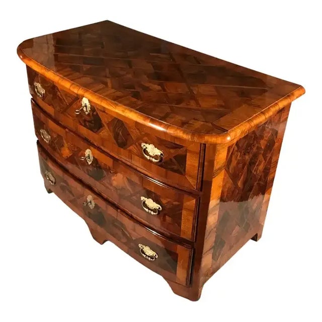 This original 18th century baroque chest of drawers comes from Switzerland. It dates back to around 1760. The three...