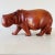 Mid-Century Hand Carved Hippopotamus Sculpture of Solid Teak Measures approx: 10H x 19L x 10D Please visit my other...