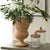 Woven in the form of a classical ceramic urn, this statuesque wicker vessel is an unexpected look. Display just as it is,...