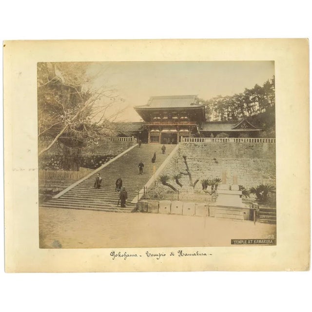 Ancient View of Yokohama is an original vintage albumen print on single cardboard: 34 x 26 cm. It was realized in 1890s....