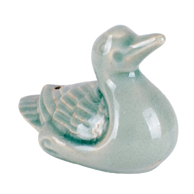 Korean celadon duck water dropper. Excellent condition with crazing. 5 inches wide by 2 ½ inches deep by 3 ½ inches tall