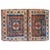 A beautiful early 20th century Persian Turkmen rug composed with two squares each with its own medallion amidst fields of...