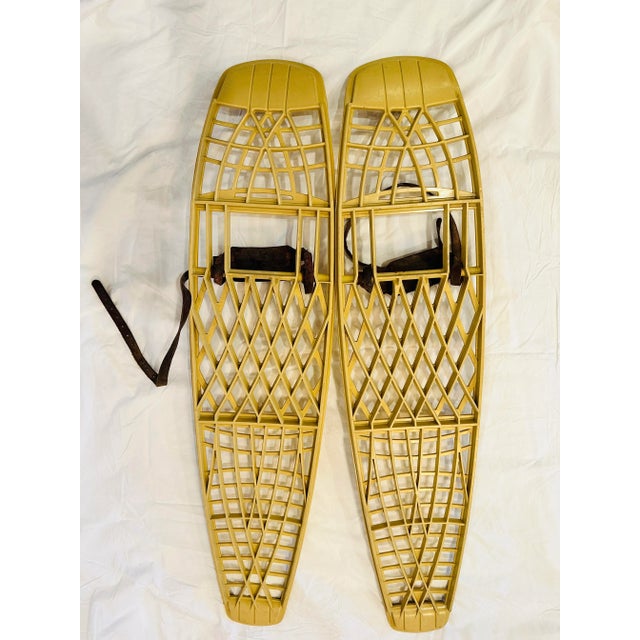 Step into mid-century outdoor style with this impressive pair of Victor snowshoes made by Woodstream Corporation of...