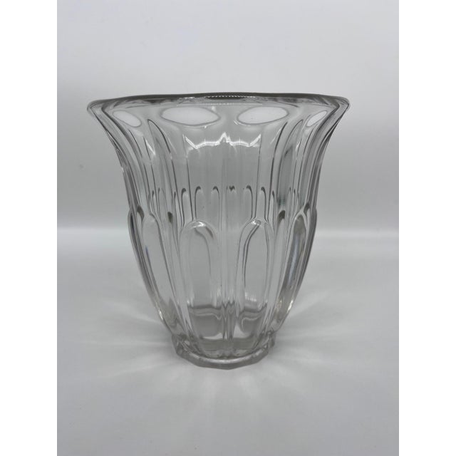 Vase of the 1950s signed Val Saint Lambert. Crystal ashtray with its mortar from the 70s, Daum model not signed. This...