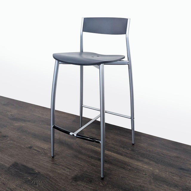 This stool was designed by Sergio Mian for Altek Italia Design. The frame is tapered steel in a brushed nickel finish....