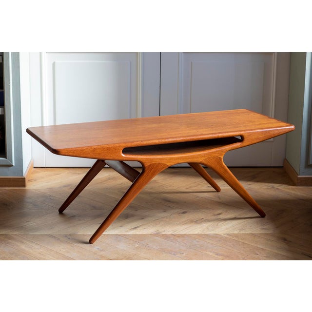 Vintage SMILE Coffee Table by Johannes Andersen, 1960s, in Very Good conditions. Designed 1960 to 1969 This piece has an...