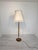Danish Teak and Brass Floor Lamp from the 1960s/1970s Stylish Danish teak and brass floor lamp from the 1960s or 1970s....