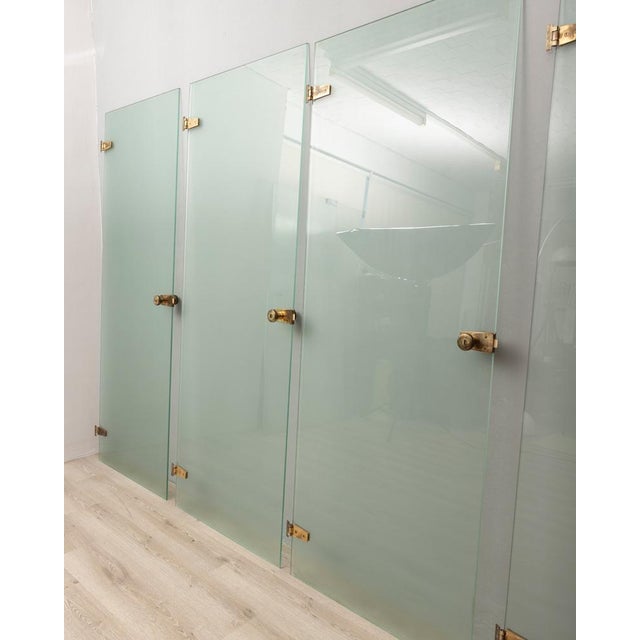 Set of four tempered glass doors with golden brass inserts and handles, supplied with key, Fontana Arte design, 1960s....