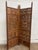 This is a stunning vintage hand carved two panel teak room divider or folding screen, possibly Indian or Thai. The...