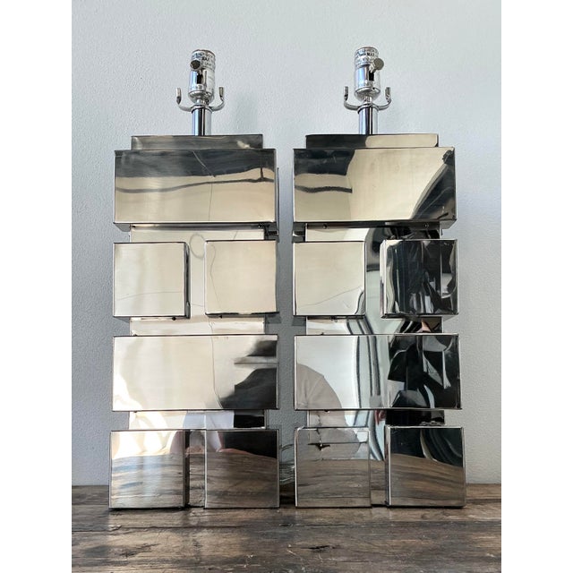 This striking pair of vintage table lamps represents the height of 1970s Brutalist design, masterfully crafted in the...