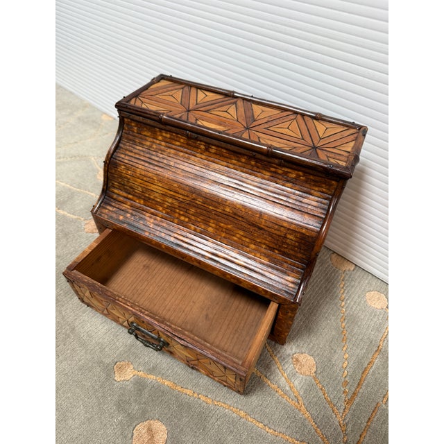 Design Plus Gallery presents a Vintage Bamboo Trinket Box. Beautifully inlaid with bamboo reeds that are set in a triangle...