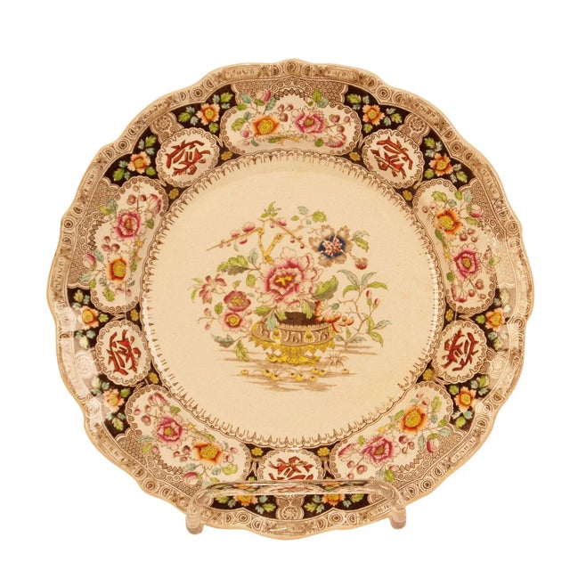 A set of 17 English ironstone plates, marked Indian Ironstone, circa 1880. Two are chipped and one has a hairline crack....