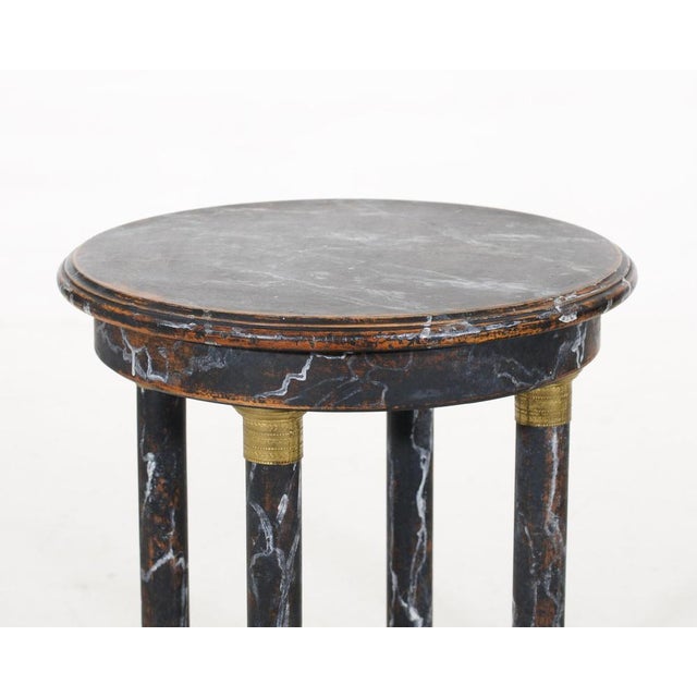 Fine European pairs of black and white marble painted pedestals table, with brass hardware, 20th Century H. 66 Dia. 41 cm...