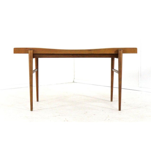 Lovely, authentic 1960s side table or oversized plant table in a typical design, featuring a beautiful white top and teak...