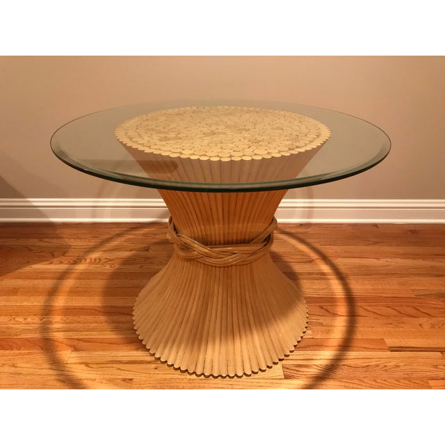 Vintage 80s McGuire style round glass-topped haystack pedestal dining table and 4 matching bamboo chairs. Glass table top...