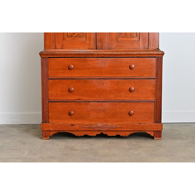 A Swedish pine buffet à deux corps (that is, a cabinet on chest in two sections) with origins in the 18th century designed...