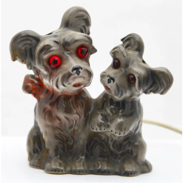 Scottie dog perfume lamp in the form of a terrier puppy and mother/father attributed to Carl Scheidig Grafenthal, Germany....