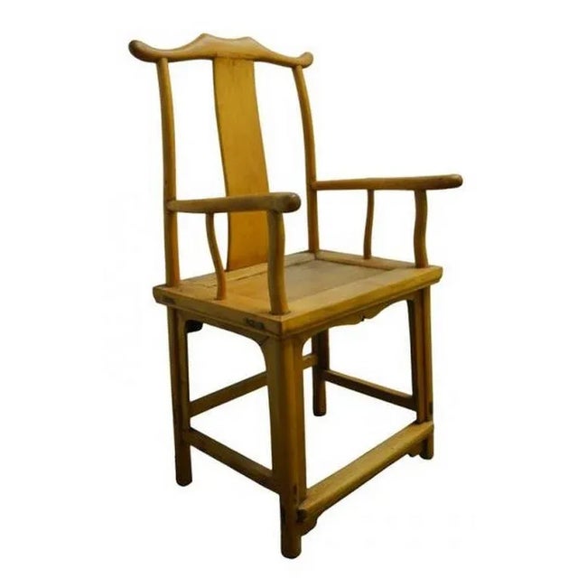 A 19th century Chinese lamp hanger side chair with natural wood finish. This Chinese lamp hanger chair was made with...