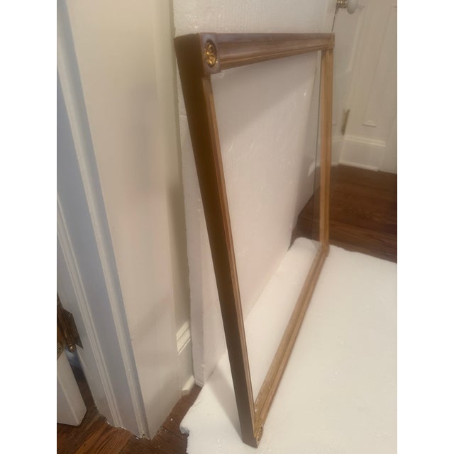 Gilded gold frame with rose gold highlights. Finished corners with rosettes. Custom made. Inside opening 25 15/16” wide x...