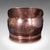 This is an antique hand finished coal scuttle. An English, copper and brass fireside store or fuel keeper, dating to the...