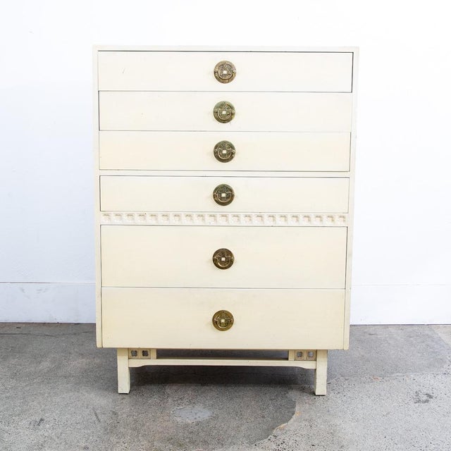 This vintage compact modern 6 drawer highboy dresser features unique Mid-Century Modern design including white finish and...