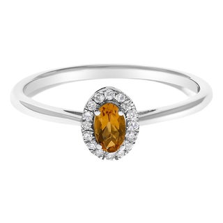 10K White Gold 5X3MM Oval Orange Citrine and Diamond Accent Halo Ring (I-J Color, I1-I2 Clarity) - Ring Size 5.5 For Sale