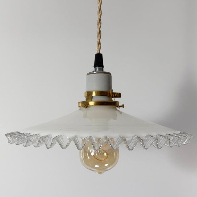 A beautifully hand-blown French white opaline glass pendant light dating to the 1930s. Sourced in Provence, this classic...