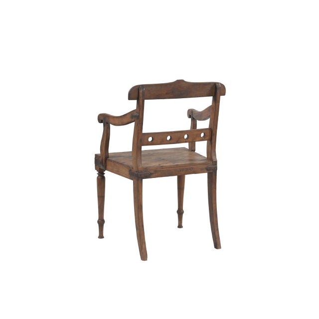 This Vintage Anglo-Indian Teakwood Armchair is handcrafted from solid teakwood, featuring elegantly curved arms, turned...