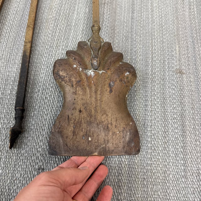 Design Plus Gallery presents a Set of Four Vintage Fireplace Tools. Traditional styling in solid brass, with shovel,...