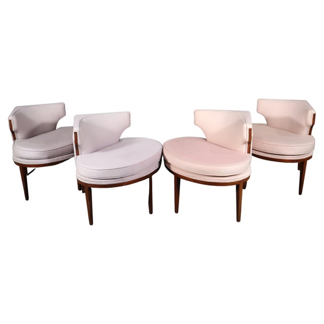 Set of four unique corner chairs in pink and purple upholstery. Framed on walnut wood with triangle backs.