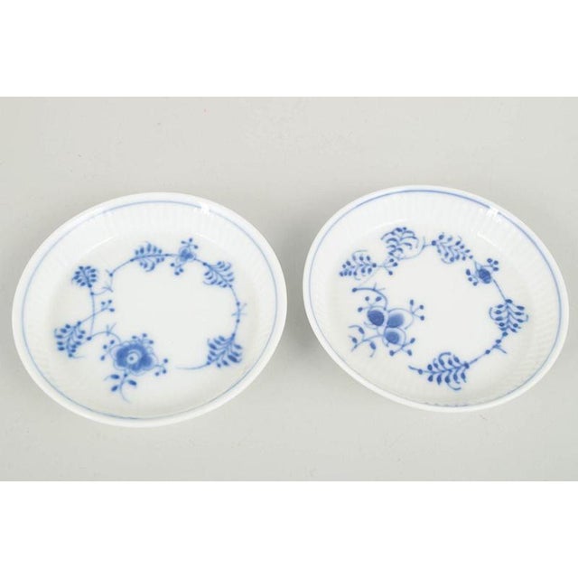 Royal Copenhagen Blue Fluted Plain bottle coasters, set of 2, 1980s. Set of two small bottle coasters in Blue Fluted...