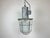 Large industrial factory hanging lamp made in former Czechoslovakia during the 1960s. It features a cast aluminium body, a...