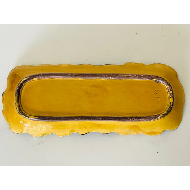 Antique polychrome majolica elongated dish.