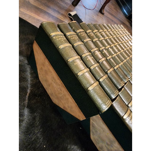 Beautiful green antique Set of forty-eight volumes of Waverly Novels. The widths vary so the total width of the 48 volumes...