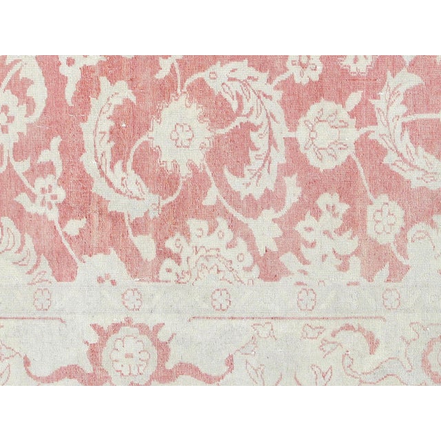 This vintage Egyptian Sultanabad rug represents a distinguished tradition of textile artistry from the Nile delta region....