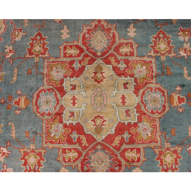 Orange Antique Turkish Oushak Rug on a Blue Background and Orange-Red Color Border For Sale - Image 8 of 12