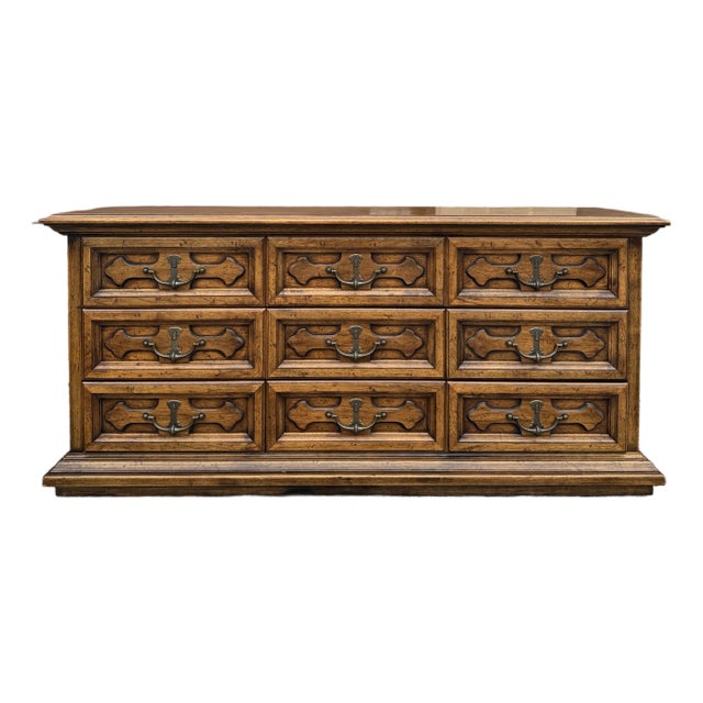 1970s Henredon Fine Furniture Spanish Revival Oak 9 Drawer Rolling Low Dresser For Sale