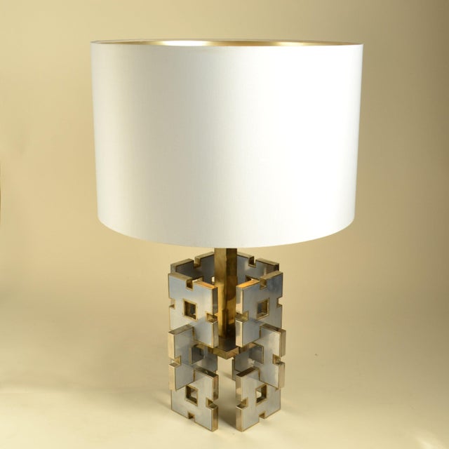 A rare, striking table lamp designed by gaetano sciolari for italian sciolari lighting during the 1970's. The lamp is...