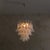 A contemporary Italian glass chandelier in the manner of Mazzega, composed of 40 handblown Murano glass elements. Each...