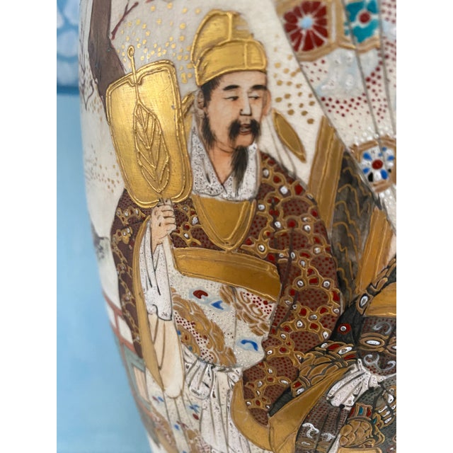 Lovely pair of antique Japanese Meiji period (1868-1912) Satsuma porcelain vases turned lamps with tea stained colors and...