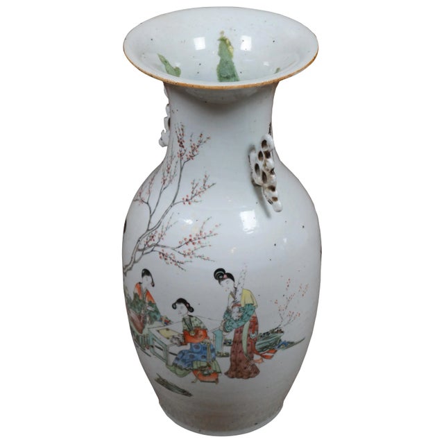 An impressive Antique 19th century Chinese polychrome floor vase with double handles, a scene of geisha figures seated in...
