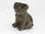 Seated and solid, this 1960s English composite stone dog figure blends folk art simplicity with expressive mass. Bulldogs...