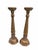 Elegant pair of vintage Neoclassical candlesticks featuring fluted column shafts accented with carved lotus and foliate...