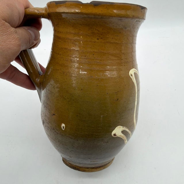 Cream 19th Century French Regional Slipware Earthenware Pitcher With Tulip Motif For Sale - Image 8 of 17