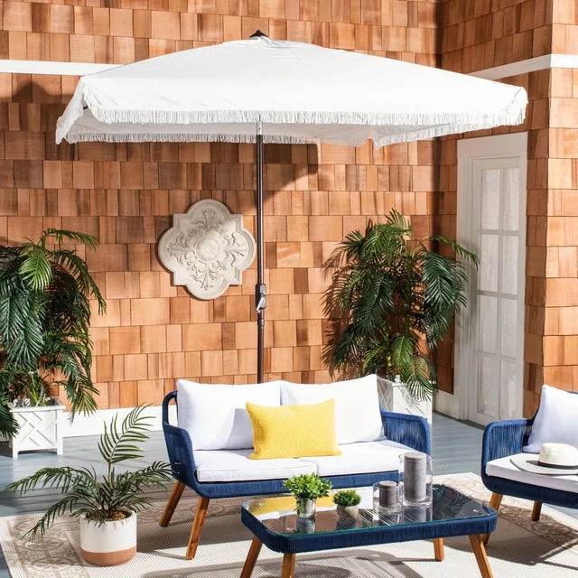 Summer afternoons at Mayfair’s exclusive private member’s club inspired this posh square crank umbrella. Its classic white...