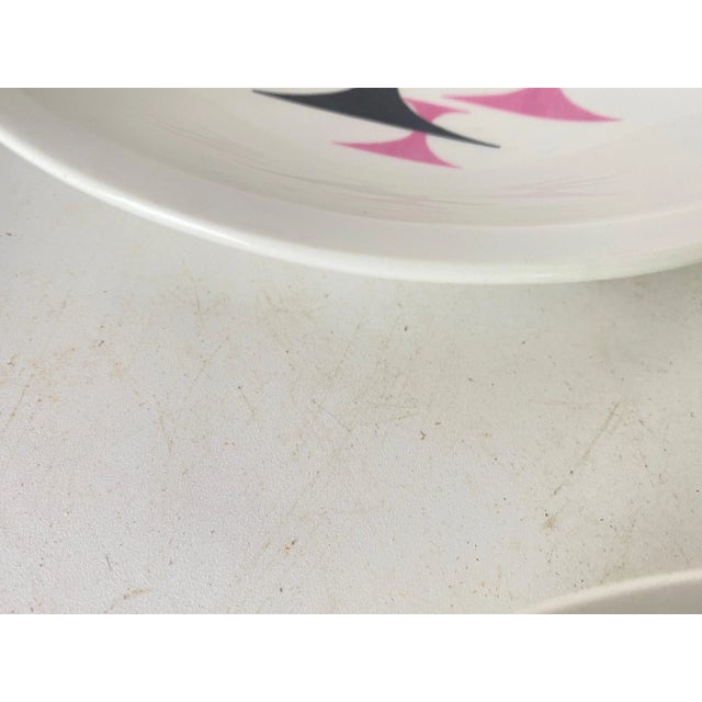 Plates in Ceramic. It has been made in France during the 20th century. Pink ,white and Black colors Modernist Geographical...