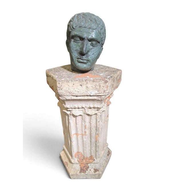 An elegant and evocative Italian marble sculptural head in the Classical style, reflecting the enduring artistic influence...