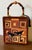 One of a kind wooden cigar box purse. The front and back images are from artist Celeste Peters “Groovy Martini II”...