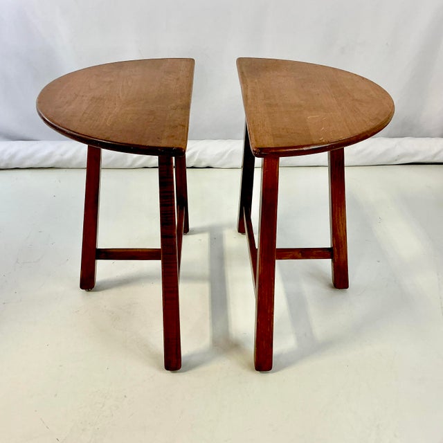 This pair of Swedish Folk Art Teak Side Tables are gorgeous in their simplicity. The half round table tops are supported...